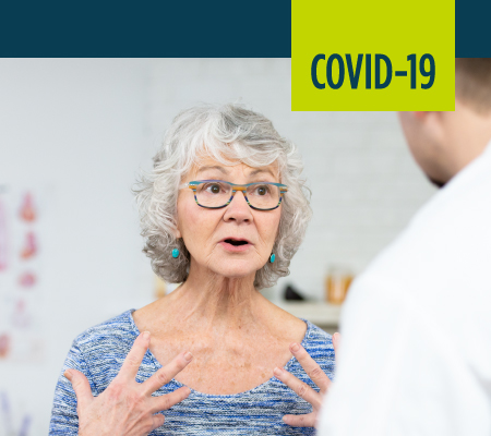 A woman and her doctor discuss coronavirus.