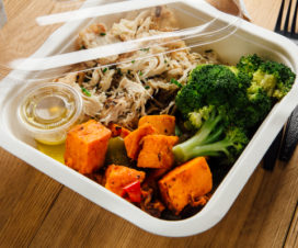 chicken, broccoli and carrots in a to-go container