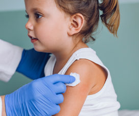 Girl receives flu shot
