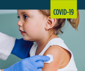 A girl gets a vaccine.