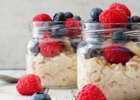 oatmeal in jar with berries on top