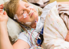 woman sleeping with sleep study wires on her face