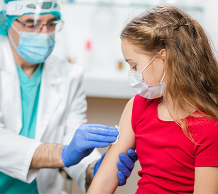 Image of young child getting the COVID-19 vaccine
