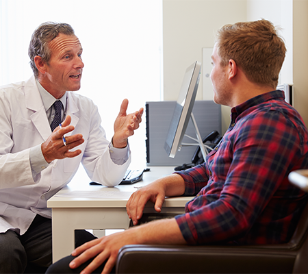 doctor talking to patient about ulcerative colitis