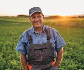 farmer standing in field