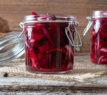 A jar of pickled beets