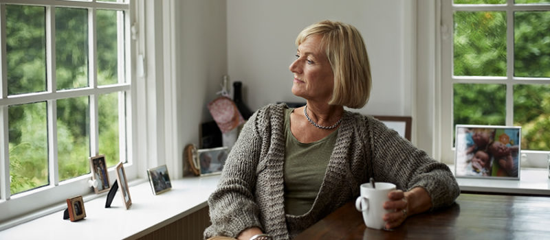 Woman relaxing thinking about aneurysm risk